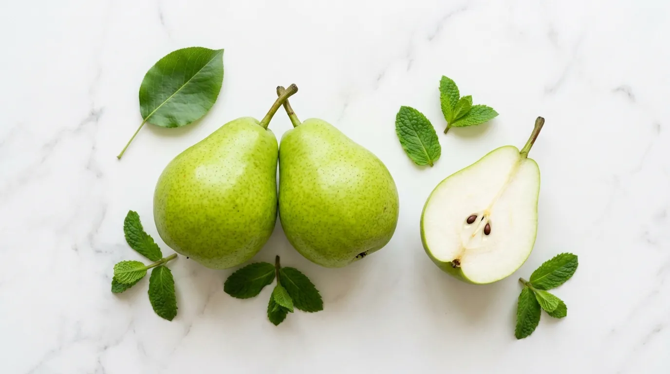 pear-high-fiber-diabetes-blood-sugar Fresh green pears whole and sliced on white marble — pears high fiber content blood sugar management diabetes
