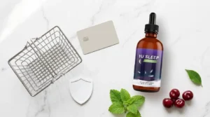 Yu Sleep bottle beside shopping basket credit card and security shield with tart cherries and lemon balm on white marble — where to buy Yu Sleep official website current price safe purchase 2026